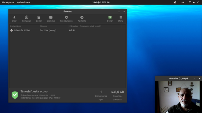 Captura de pantalla del sistema PopOs junto a timeshift para crear snapshot del sistema y rikylinux
